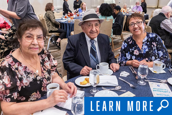 senior citizen and family at Centenarian event, click to learn more